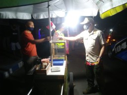 Kibarkan Bendera Merah Putih Sebagai Simbol Optimisme Lawan Covid-19